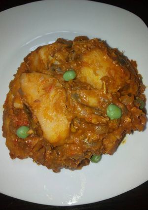 A picture of Yam porriage with green peas.