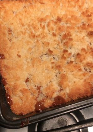 Una foto de Torta o cuadraditos de coco y leche condensada con masa sable