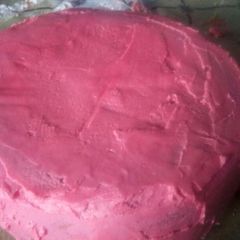 A picture of Simple ginger cake with strawberry icing.