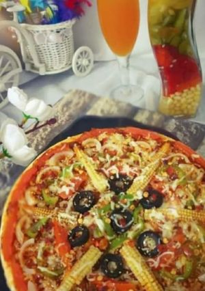 ભાખરી પીઝા (Bhakhri Pizza Recipe In Gujarati) રેસીપી મુખ્ય ફોટો