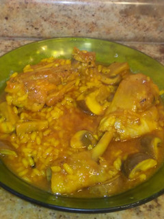 Una foto de Arroz meloso de pollo y setas