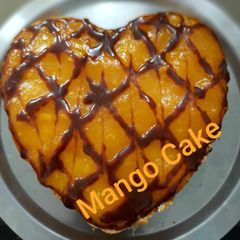 A picture of Egg less mango cake.