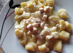 Una foto de Ñoquis de queso con la salsa de mi comadre