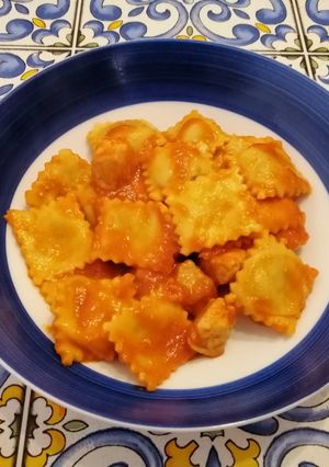 A picture of Eggplant Ravioli with Swordfish Sauce.