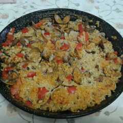 Una foto de Arroz con almejas