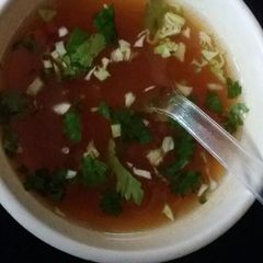 A picture of Tomato Coriander Soup.