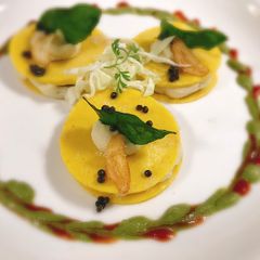 A picture of Crepe khandvi ravioli with mashed potatoes.