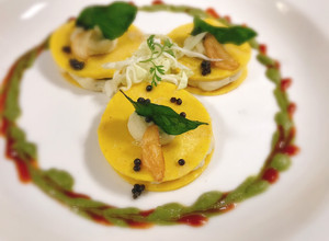 A picture of Crepe khandvi ravioli with mashed potatoes.
