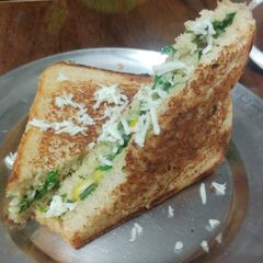 A picture of Spinach corn sandwich.