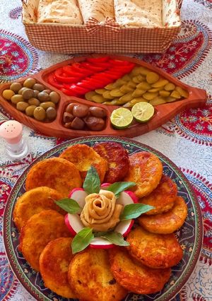 عکسی از دستور کوکو سیب زمینی پخته