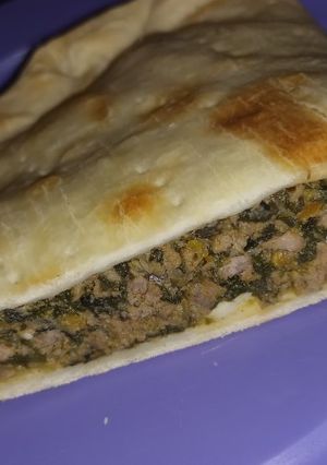 Una foto de Calzone de carne y verduras