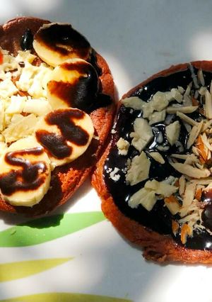 A picture of Beetroot pancake with chocolate topping.