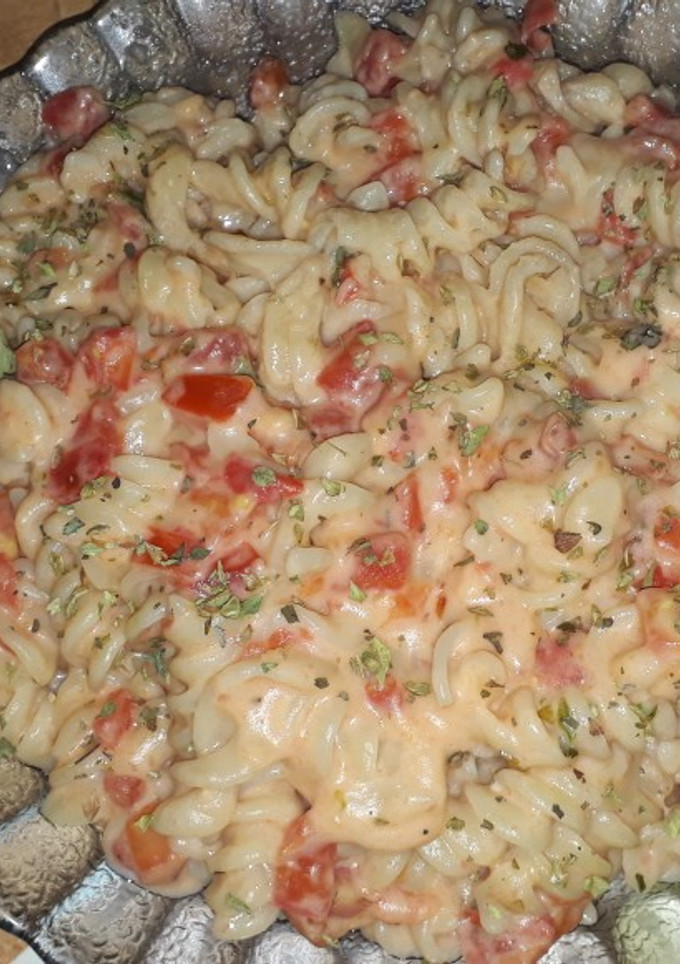 Una foto de Fideos con salsa blanca