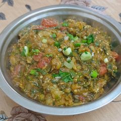 A picture of Smoky Brinjal with Spinach (Green Olo Style).