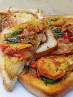 A picture of Fried bread with Potatoes.