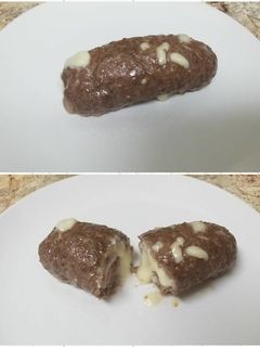 Una foto de Rollo de carne molida relleno con jamón y queso