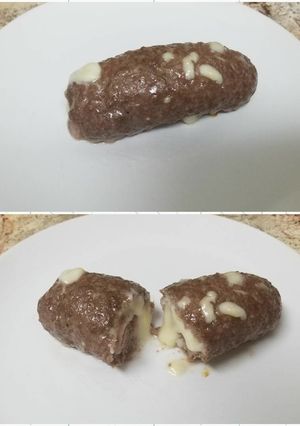 Una foto de Rollo de carne molida relleno con jamón y queso