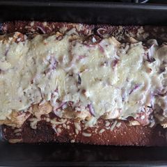 A picture of Enchiladas with black bean mole.