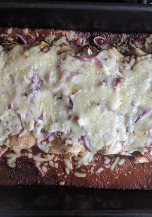 A picture of Enchiladas with black bean mole.
