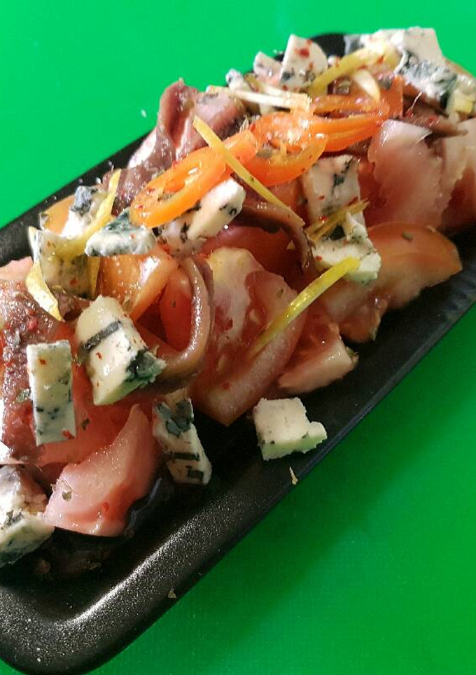 Una foto de Ensalada mar y tierra fusion