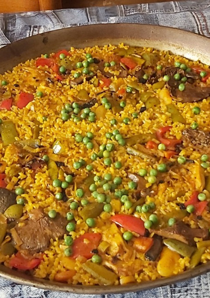 Una foto de Paella valenciana vegana