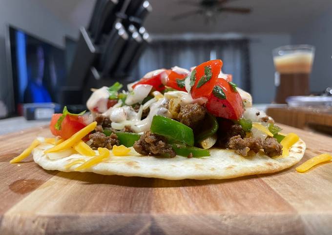 Steps to Prepare Quick Beef & Cheese Tostada