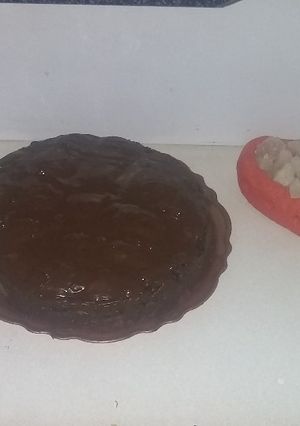 Una foto de Torta con crema pastelera de chocolate (bañada con chocolate)