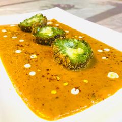 A picture of Deep fried Kofta shaam savera in makhani gravy.