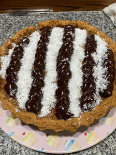 Una foto de Tarta de coco con flan de dulce de leche