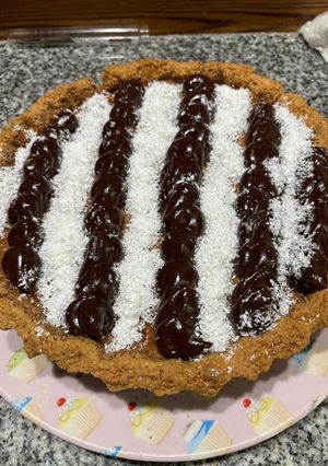 Una foto de Tarta de coco con flan de dulce de leche