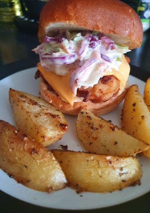 A picture of Buttermilk fried chicken sandwich with homemade colslaw 🤪.