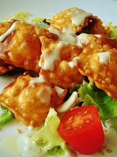 Una foto de Raviolis fritos a los cuatro quesos