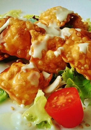 Una foto de Raviolis fritos a los cuatro quesos