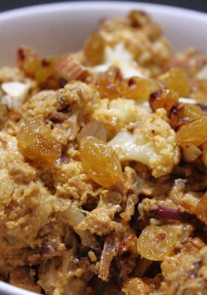 A picture of Veg:Baked Cauliflower and Golden Raisins with Almond-Yogurt Sauce.