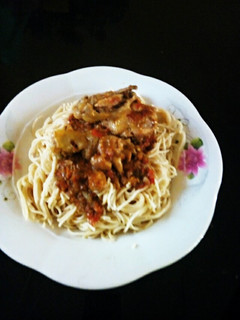 A picture of Spaghetti with stew.