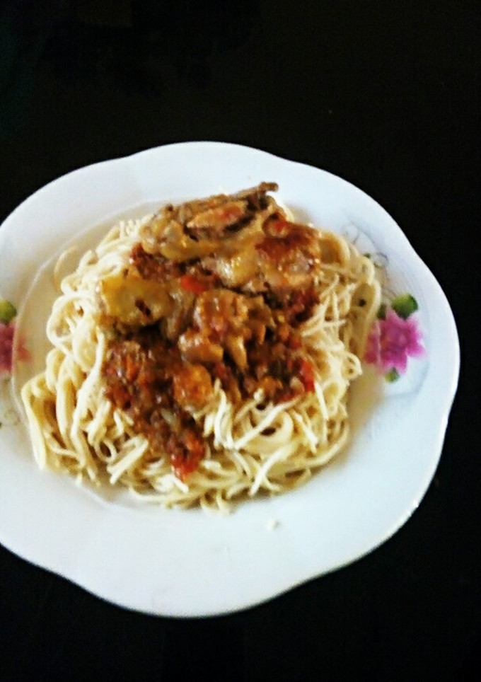 A picture of Spaghetti with stew.