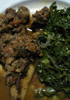 A picture of Stewed beef with greens.