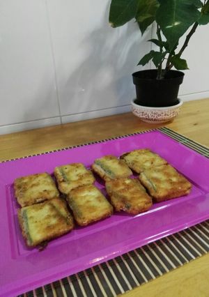 Una foto de Bocaditos empanados de calabacín, jamón y queso