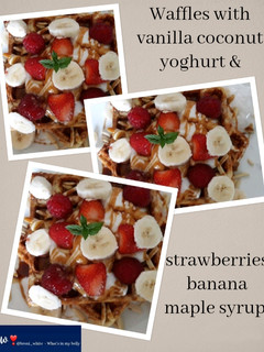 A picture of Waffles with vanilla coconut yoghurt & strawberries banana maple.