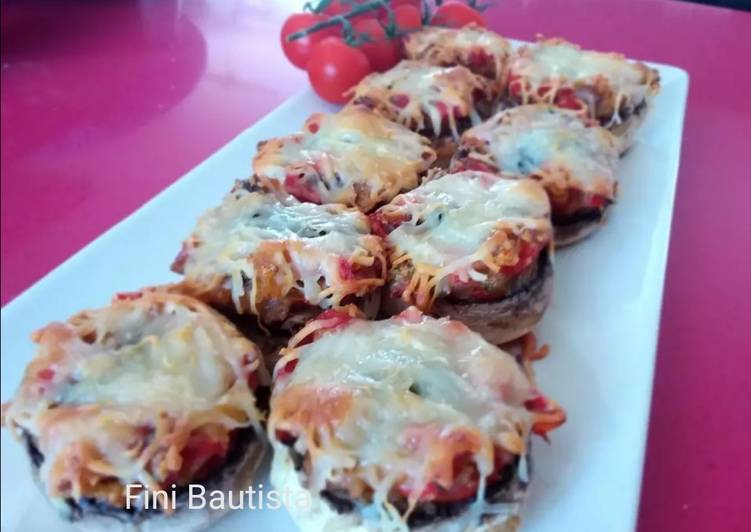 Champiñones rellenos con ajo negro