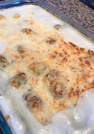 Una foto de Malfattis de espinaca y ricotta con salsa blanca