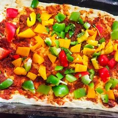 A picture of Veggie Loaded pizza with homemade dough.