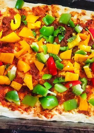 A picture of Veggie Loaded pizza with homemade dough.
