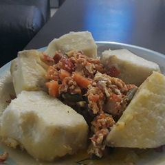 A picture of Boiledbyam with egg sauce.
