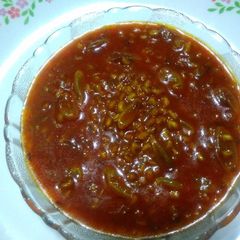 A picture of Methi seeds and rasin sbji.