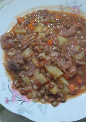 Una foto de Guiso de lentejas y arroz