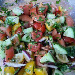 Tomato, cucumber and avocado salad A picture of Tomato, cucumber and avocado salad.