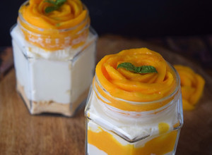 A picture of No bake mango cheesecake jars.