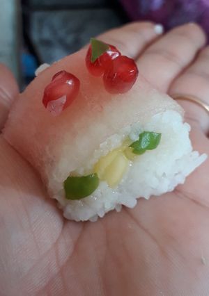 A picture of Fruity and spicy sushi.