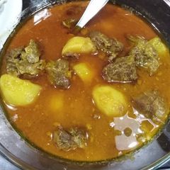 A picture of Aalu gosht.